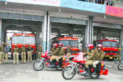 As part of the Fire Safety Week, personnel of fire and emergency services take part in a drill in Srinagar on Saturday. 