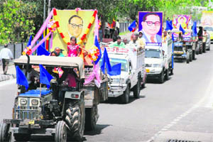 People take out a procession to mark the 121st birth anniversary of Dr BR Ambedkar in Jammu on Saturday.