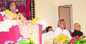 Swami Vishwatmanand Saraswati addresses the annual day function of Rashtriya Sanskrit Sansthan, Shri Ranbir Campus, Kot Bhalwal, in Jammu on Saturday. 