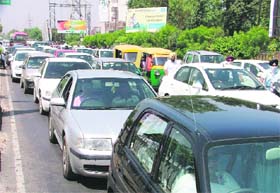 Vehicles being driven bumper-to-bumper on the Ferozepur road in Ludhiana