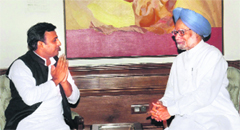 PM Manmohan Singh with UP CM Akhilesh Yadav during a meeting in New Delhi on Saturday.