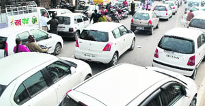 A long queue of vehicles on a road in Patiala. 