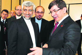 Irans national security official Saeed Jalili (L) with Turkish Foreign Minister Ahmet Davutoglu before a meeting in Istanbul. 
