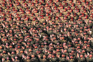 Soldiers applaud North Korea leader Kim Jong-Un during a ceremony in Pyongyang. 
