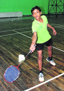 Kartik reaches for the shuttle during a match in the Panchkula District Ranking Tournament at Tau Devi Lal Stadium in Sector 3, Panchkula, on Sunday.