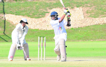 Karan Aggarwal of Fatehgarh plays a shot against Mohali in a match held at the Sector 16 cricket stadium, Chandigarh, on Sunday. Tribune photo: Pradeep Tewari