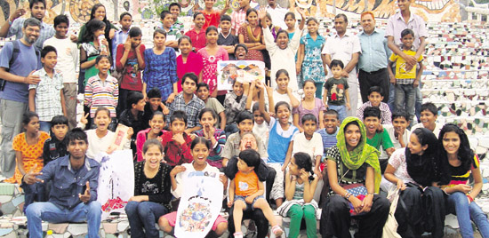 Participants at a collage-making workshop at the Rock Garden, Chandigarh, on Sunday. A Tribune photograph