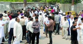 Voters at a polling booth in Zafrabad in Delhi on Sunday.