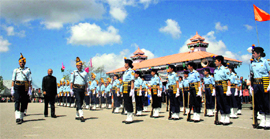 Vidhan Sabha Speaker Tulsi Ram inspects a guard of honour at a Himachal Day function at the Ridge in Shimla on Sunday.