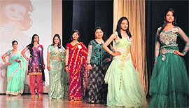 College students walk the ramp during a farewell party in Ludhiana. 