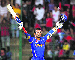 Rajasthan Royals Ajinkya Rahane celebrates his century against Royal Challengers Bangalore in Bengaluru on Sunday. 