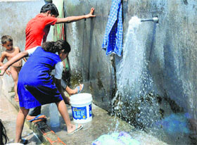 Drinking water goes waste in the absence of taps at Pandit Colony, Kajehri, Chandigarh, on Monday.