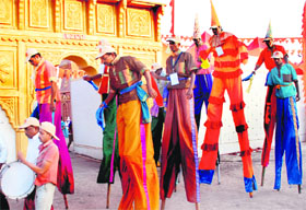 Men on stilts take a round on the concluding day of the silver jubilee celebrations of Zonal Cultural Centres at Parade Ground, Sector 5, Panchkula, on Monday.