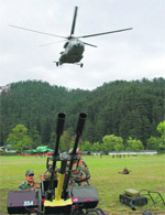 Army personnel take part in a mock drill at the Annandale ground in Shimla