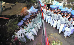 Members of the Citizens for Annandale hold a protest near the Annandale ground in Shimla