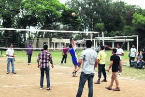 Players in action during a volleyball match in the University of Jammu on Monday. 