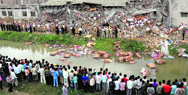 The collapsed building of Shital Fabrics at Focal Point Extension in Jalandhar on Monday.