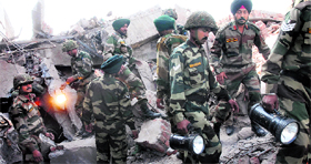Army jawans and the police during the rescue operation.