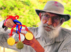 KK Bhanot shows his medals.