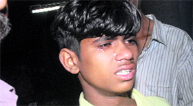 A boy mourns his relatives death.