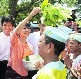 Pro-democracy leader Aung San Suu Kyi takes part in Thingyan, Myanmars annual New Year water festival