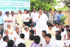 INLD general secretary Ajay Chautala speaks during a protest against the MDU Vice-Chancellor in front of his office in Rohtak on Tuesday