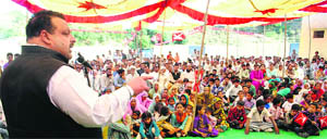 Devender Rana, political adviser to Chief Minister, addresses a public rally in Nagrota on Tuesday.