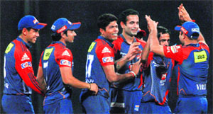 Delhi Daredevils celebrate the dismissal of Mumbai Indians Richard Levi during their match in Mumbai on Monday. Daredevils won by 7 wickets