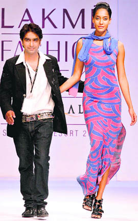 Designer Vipin Batra on the ramp with a model