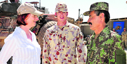 Australias Prime Minister Julia Gillard (left) with Capt Mark Tutton (centre) and Lt Col Judin, commander of the 3rd Afghan Brigade, at the multinational base in southern Afghanistans Tarin Kot.