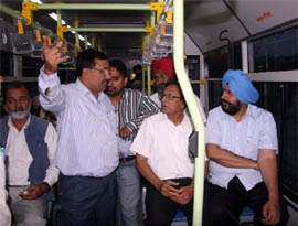 Mayor Baljit Singh Beer Behman along with Senior Deputy Mayor Tarsem Goyal and others takes a ride in a city bus on Wednesday.