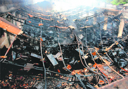 A view of the gutted showroom at Pabhat village in Zirakpur.