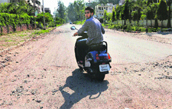 A potholed road in Sector 50, Chandigarh. 