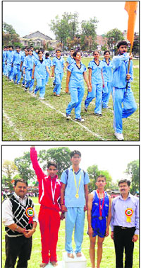 (Above) Polytechnic students during a march past on the inaugural day of the 18th Inter-Polytechnic Sports and Cultural meet in Kangra on Wednesday; and (below) winners of the 1,500-m race during the meet pose with Sanjay Choudary, MLA, Kangra, and RK Sharma, Principal, Polytechnic, Kangra