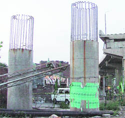 Lakkar Bridge project, initiated in 1997, still remains incomplete.