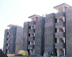 Work on flats being constructed for the poor remains unfinished