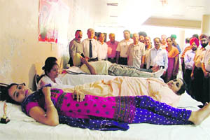 Donors at a blood donation camp organised by the All India State Bank of Patiala Employees Federation, Ludhiana, on Wednesday. 