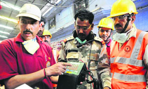 A National Disaster Response Force personnel shows a life-detector being used in rescue operations. A teenager was rescued with the help of the gadget on Wednesday.