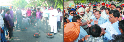 Shopkeepers burn tyres to protest against the demolition drive; Leaders of the Beopar Mandal (right) speak to the officials of the Improvement Trust.