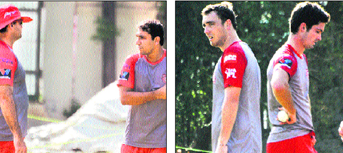Azhar Mahmood with the bowling coach (left) and two new players of the Kings XI Punjab team practise at the PCA Stadium in Mohali.