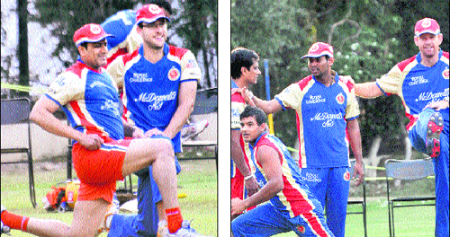 Anil Kumble with Daniel Vettori (left) and members of the Royal Challengers Bangalore team exercise a day before their match, scheduled for Friday.