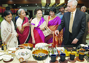 Delhi Lieutenant-Governor Tejendra Khanna admires the articles in an exhibition, Celebrating 100 years of Delhi as Capital of Modern India held 