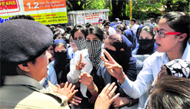 Girls students during a demonstration against the death of a fellow student in Dehradun on Thursday.