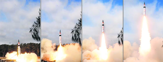 The 5,000-km range Agni V climbs majestically on a plume of fire into the morning sky from the Wheeler Island launchpad in a textbook takeoff