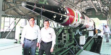 Vijay Kumar Saraswat (left) and Avinash Chander with Agni V a day before the launch. 