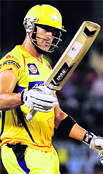 Chennai Super Kings Faf du Plessis raises his bat after scoring a half century against Pune Warriors during their match in Chennai on Thursday