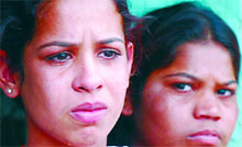 Tears well up in the eyes of these hutment dwellers after the JCB machines levelled their home and hearth during the demolition drive near Prajapat Colony on Friday.
