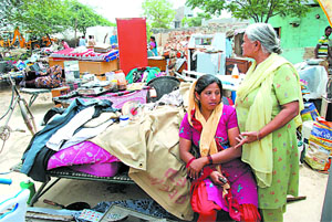Two women try to fathom the storm in their life in the form of the demolition drive launched by the Bathinda Improvement Trust that rendered them homeless and without a shelter with nowhere to go.