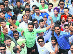 SOPU members celebrate after the party announced its panel members for the next elections  at the Panjab University, Chandigarh, on Friday. 