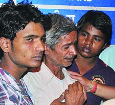 Grief-stricken relatives of the victims in New Delhi on Friday.